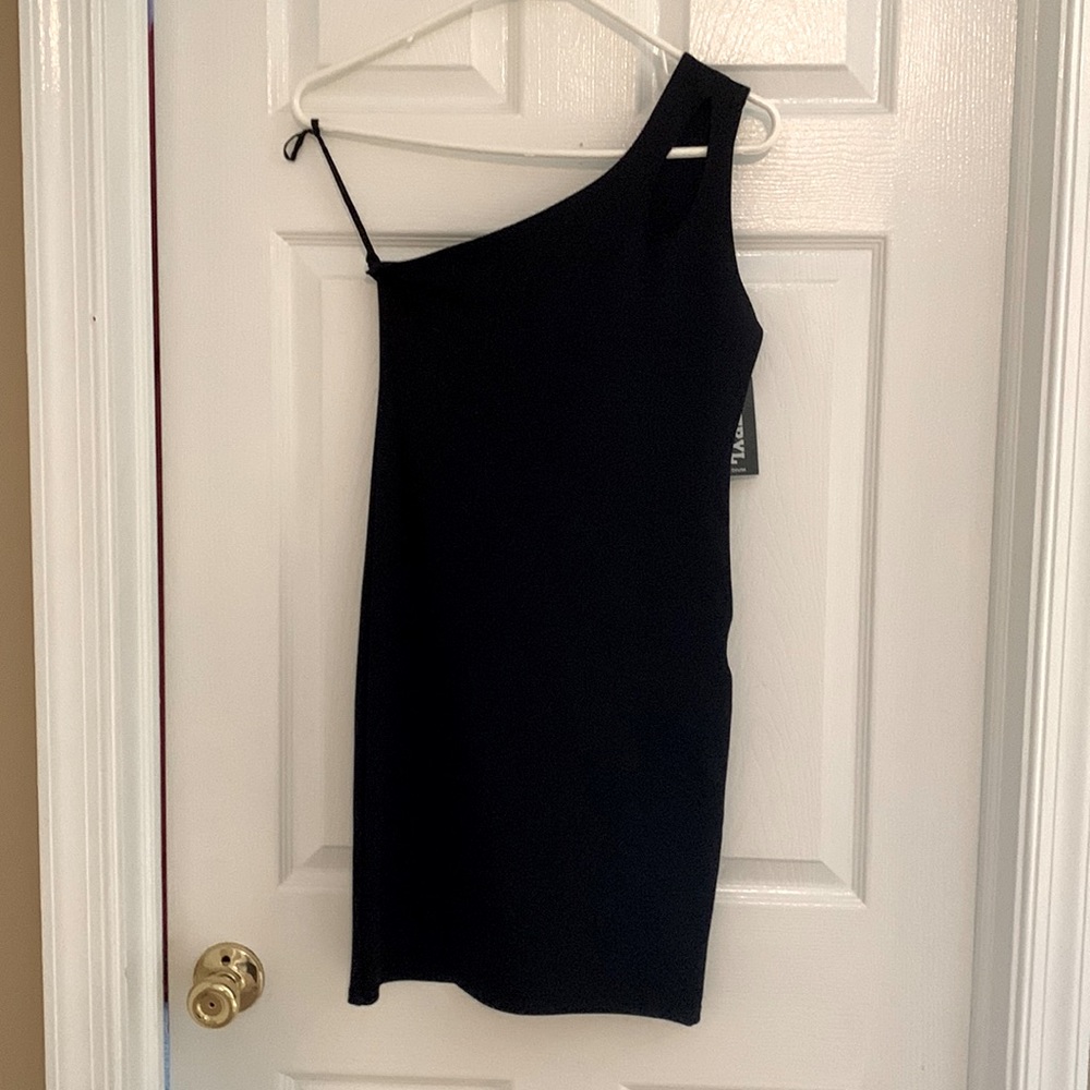 Black cocktail dress. One sleeve